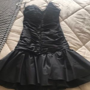 Betsy’s Johnson black party dress .